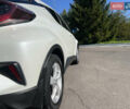 Белый Тойота C-HR, объемом двигателя 1.8 л и пробегом 139 тыс. км за 20900 $, фото 16 на Automoto.ua
