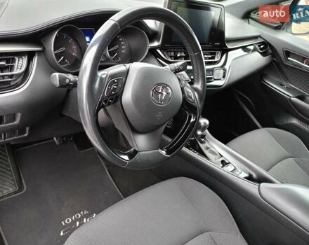 Белый Тойота C-HR, объемом двигателя 1.2 л и пробегом 93 тыс. км за 18698 $, фото 16 на Automoto.ua