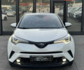 Белый Тойота C-HR, объемом двигателя 1.8 л и пробегом 76 тыс. км за 26300 $, фото 2 на Automoto.ua