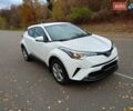 Белый Тойота C-HR, объемом двигателя 1.2 л и пробегом 93 тыс. км за 18698 $, фото 4 на Automoto.ua