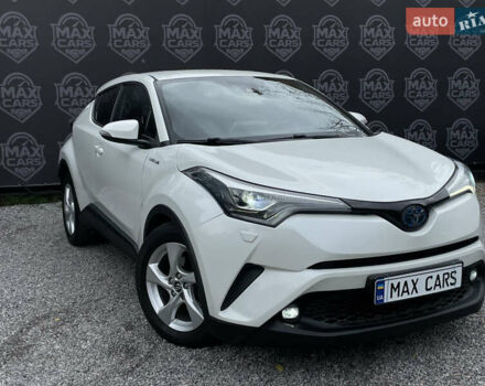 Тойота C-HR 2018 у Києві на Automoto.ua Білий Тойота C-HR, об'ємом двигуна 1.8 л та пробігом 74 тис. км за 22900 $, фото 1 на Automoto.ua
