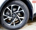 Белый Тойота C-HR, объемом двигателя 1.8 л и пробегом 77 тыс. км за 23800 $, фото 1 на Automoto.ua