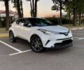 Белый Тойота C-HR, объемом двигателя 1.8 л и пробегом 83 тыс. км за 16900 $, фото 1 на Automoto.ua