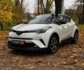 Белый Тойота C-HR, объемом двигателя 1.8 л и пробегом 79 тыс. км за 26290 $, фото 1 на Automoto.ua