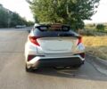 Белый Тойота C-HR, объемом двигателя 1.2 л и пробегом 100 тыс. км за 9800 $, фото 1 на Automoto.ua