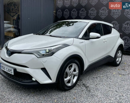 Тойота C-HR 2018 у Києві на Automoto.ua Білий Тойота C-HR, об'ємом двигуна 1.8 л та пробігом 74 тис. км за 22900 $, фото 1 на Automoto.ua