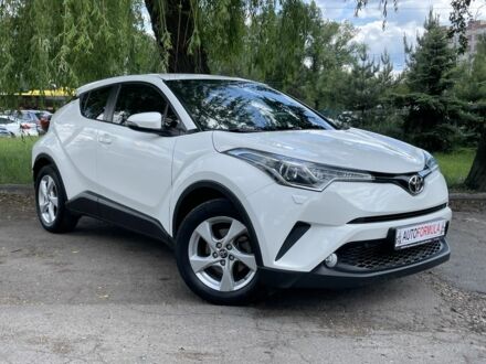 Тойота C-HR 2018 в Киеве на Automoto.ua Белый Тойота C-HR, объемом двигателя 1.2 л и пробегом 53 тыс. км за 18990 $, фото 1 на Automoto.ua