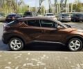 Коричневый Тойота C-HR, объемом двигателя 1.2 л и пробегом 57 тыс. км за 23500 $, фото 1 на Automoto.ua