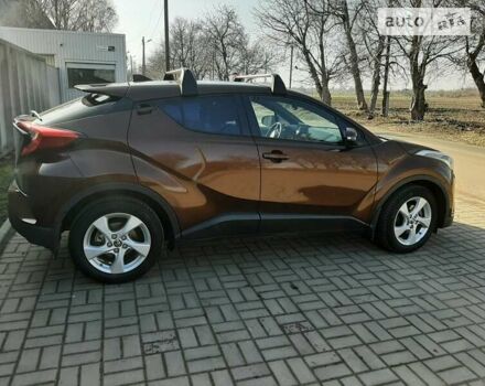 Коричневый Тойота C-HR, объемом двигателя 1.2 л и пробегом 143 тыс. км за 18500 $, фото 3 на Automoto.ua