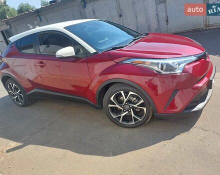 Красный Тойота C-HR, объемом двигателя 2 л и пробегом 77 тыс. км за 19900 $, фото 1 на Automoto.ua