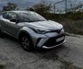 Серый Тойота C-HR, объемом двигателя 2 л и пробегом 99 тыс. км за 26500 $, фото 1 на Automoto.ua