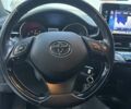 Серый Тойота C-HR, объемом двигателя 1.2 л и пробегом 126 тыс. км за 17999 $, фото 22 на Automoto.ua