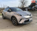 Серый Тойота C-HR, объемом двигателя 1.8 л и пробегом 112 тыс. км за 22801 $, фото 2 на Automoto.ua