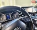 Серый Тойота C-HR, объемом двигателя 1.99 л и пробегом 86 тыс. км за 18600 $, фото 6 на Automoto.ua