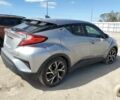 Серый Тойота C-HR, объемом двигателя 2 л и пробегом 95 тыс. км за 4900 $, фото 2 на Automoto.ua