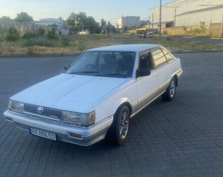 Белый Тойота Камри, объемом двигателя 1.8 л и пробегом 218 тыс. км за 1800 $, фото 1 на Automoto.ua