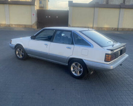 Белый Тойота Камри, объемом двигателя 1.8 л и пробегом 218 тыс. км за 1800 $, фото 2 на Automoto.ua