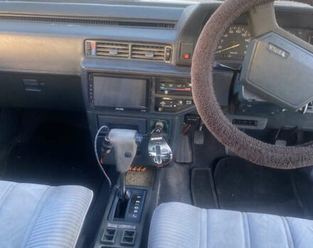 Белый Тойота Камри, объемом двигателя 1.8 л и пробегом 218 тыс. км за 1800 $, фото 8 на Automoto.ua