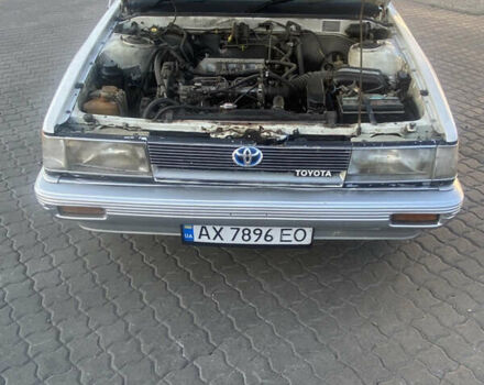 Белый Тойота Камри, объемом двигателя 1.8 л и пробегом 218 тыс. км за 1800 $, фото 13 на Automoto.ua