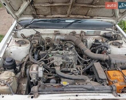 Білий Тойота Камрі, об'ємом двигуна 1.8 л та пробігом 350 тис. км за 700 $, фото 11 на Automoto.ua