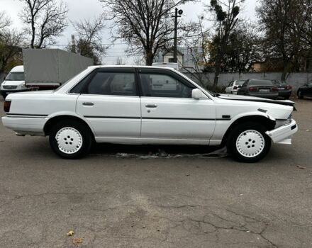 Белый Тойота Камри, объемом двигателя 2 л и пробегом 300 тыс. км за 1100 $, фото 2 на Automoto.ua