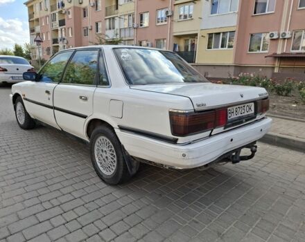 Белый Тойота Камри, объемом двигателя 2 л и пробегом 315 тыс. км за 1100 $, фото 6 на Automoto.ua