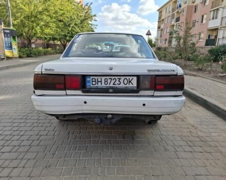 Белый Тойота Камри, объемом двигателя 2 л и пробегом 315 тыс. км за 1100 $, фото 5 на Automoto.ua