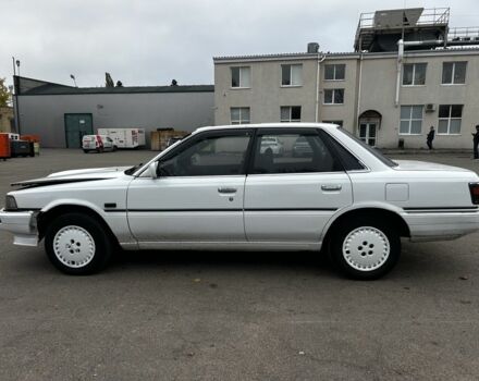 Белый Тойота Камри, объемом двигателя 2 л и пробегом 300 тыс. км за 1100 $, фото 3 на Automoto.ua