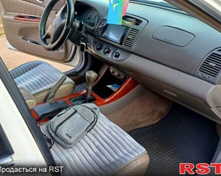Білий Тойота Камрі, об'ємом двигуна 2.4 л та пробігом 255 тис. км за 5300 $, фото 6 на Automoto.ua