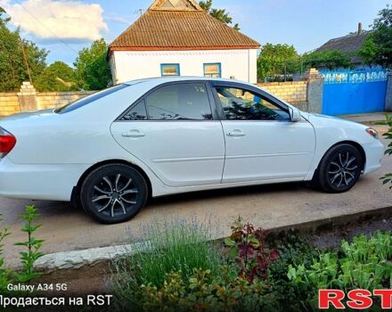 Білий Тойота Камрі, об'ємом двигуна 2.4 л та пробігом 255 тис. км за 5300 $, фото 2 на Automoto.ua