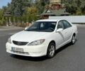 Белый Тойота Камри, объемом двигателя 2.4 л и пробегом 268 тыс. км за 4650 $, фото 1 на Automoto.ua