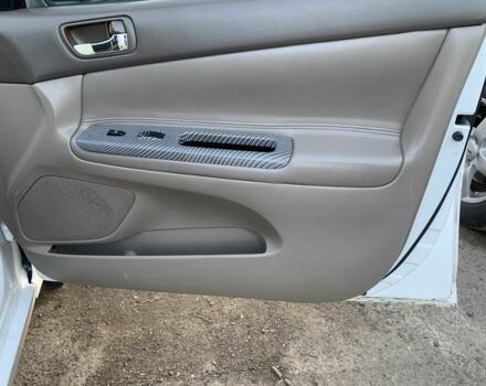 Белый Тойота Камри, объемом двигателя 2.4 л и пробегом 325 тыс. км за 5500 $, фото 12 на Automoto.ua