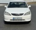 Белый Тойота Камри, объемом двигателя 2.36 л и пробегом 268 тыс. км за 4650 $, фото 1 на Automoto.ua