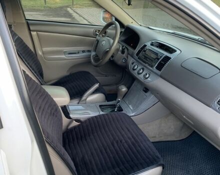 Белый Тойота Камри, объемом двигателя 2.4 л и пробегом 325 тыс. км за 5500 $, фото 13 на Automoto.ua