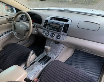 Белый Тойота Камри, объемом двигателя 2.4 л и пробегом 325 тыс. км за 5500 $, фото 11 на Automoto.ua