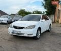 Белый Тойота Камри, объемом двигателя 2.4 л и пробегом 210 тыс. км за 2200 $, фото 1 на Automoto.ua