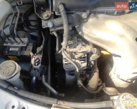 Белый Тойота Камри, объемом двигателя 2.4 л и пробегом 285 тыс. км за 6900 $, фото 5 на Automoto.ua