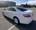 Белый Тойота Камри, объемом двигателя 2.36 л и пробегом 215 тыс. км за 10700 $, фото 1 на Automoto.ua