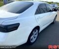 Белый Тойота Камри, объемом двигателя 2.4 л и пробегом 250 тыс. км за 8600 $, фото 1 на Automoto.ua