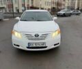 Белый Тойота Камри, объемом двигателя 2.4 л и пробегом 217 тыс. км за 7700 $, фото 1 на Automoto.ua