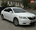 Белый Тойота Камри, объемом двигателя 2.36 л и пробегом 235 тыс. км за 8000 $, фото 1 на Automoto.ua