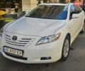 Белый Тойота Камри, объемом двигателя 2.36 л и пробегом 242 тыс. км за 9500 $, фото 1 на Automoto.ua