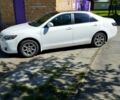Белый Тойота Камри, объемом двигателя 2.4 л и пробегом 235 тыс. км за 7500 $, фото 1 на Automoto.ua