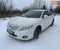 Белый Тойота Камри, объемом двигателя 2.5 л и пробегом 395 тыс. км за 9200 $, фото 1 на Automoto.ua