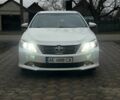 Белый Тойота Камри, объемом двигателя 2.5 л и пробегом 311 тыс. км за 10600 $, фото 1 на Automoto.ua