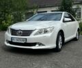 Белый Тойота Камри, объемом двигателя 2.5 л и пробегом 200 тыс. км за 12000 $, фото 1 на Automoto.ua