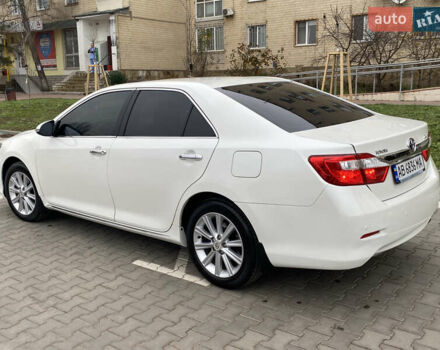 Білий Тойота Камрі, об'ємом двигуна 2.49 л та пробігом 256 тис. км за 11900 $, фото 2 на Automoto.ua