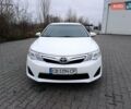 Белый Тойота Камри, объемом двигателя 2.49 л и пробегом 174 тыс. км за 9700 $, фото 2 на Automoto.ua