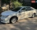 Белый Тойота Камри, объемом двигателя 2.5 л и пробегом 136 тыс. км за 14700 $, фото 1 на Automoto.ua