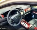 Белый Тойота Камри, объемом двигателя 2.5 л и пробегом 176 тыс. км за 13800 $, фото 4 на Automoto.ua